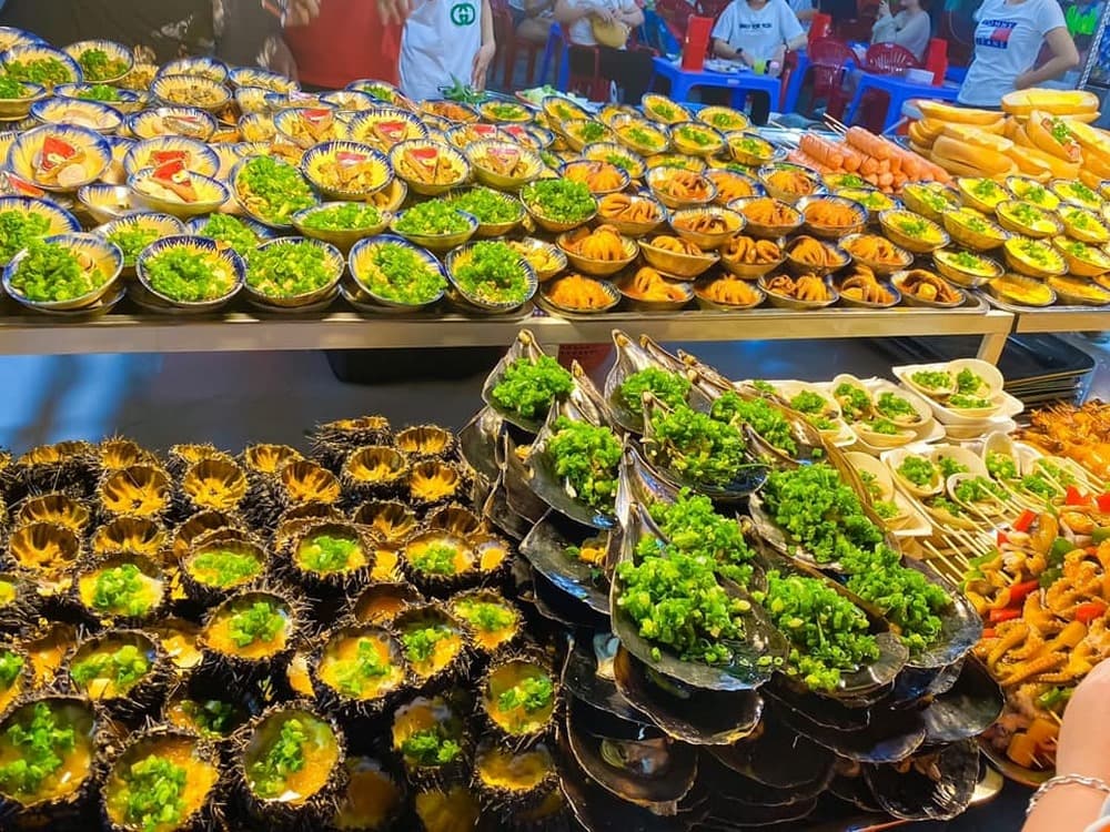 Du lịch Phú Quốc Thưởng thức nhum biển nướng mỡ hành Phú Quốc