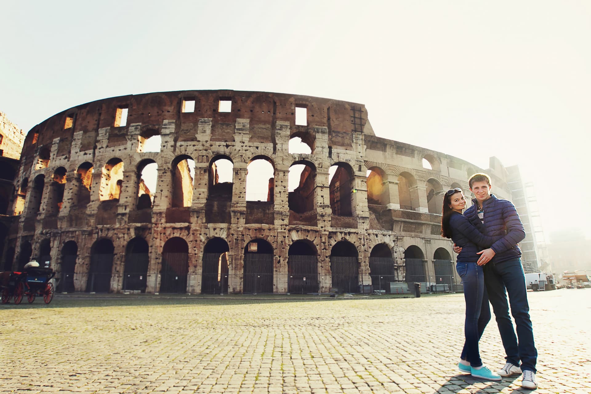 two-people-standing-near-coliseum-rome.jpg